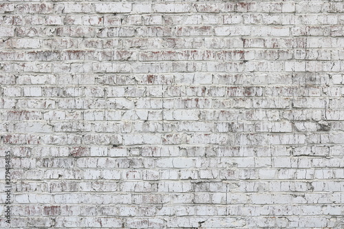Old wall made of red brick  painted white in loft style for modern designer interior of room  bar or restaurant