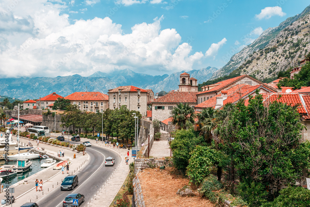 Old stoned houses in the town Kotor surrounded by high mountains, Montenegro