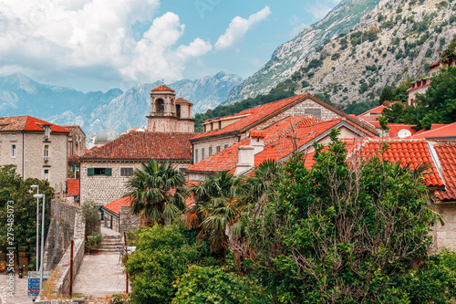 Old stone houses in the town Kotor surrounded by high mountains, Montenegro