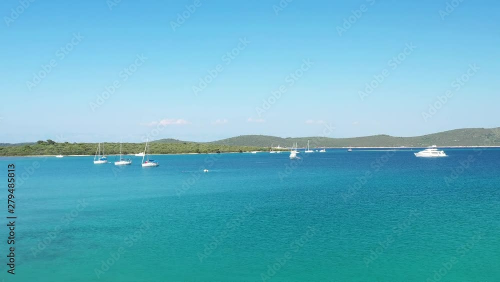 Croatia, Adriatic coast, peninsula on Veli Rat on the island of Dugi Otok, beautiful archipelago with sailboats and yachts, drone flying over blue lagoon Croatia, Adriatic coast, peninsula on Veli Rat on the island of Dugi Otok, beautiful archipelago with sailboats and yachts, drone flying over blue lagoon