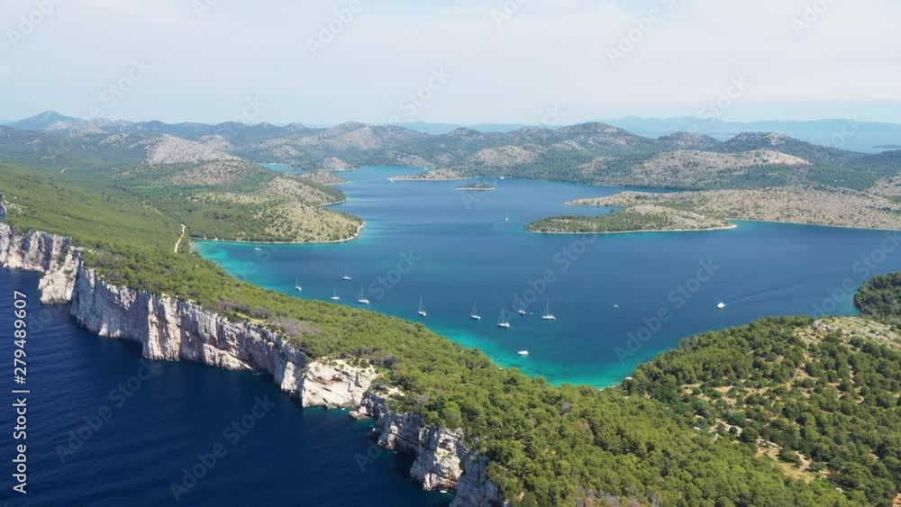 Spectacular cliffs above the sea on the shore of nature park Telascica, island of Dugi Otok, Croatia, beautiful seascape, drone aerial shot Spectacular cliffs above the sea on the shore of nature park Telascica, island of Dugi Otok, Croatia, beautiful seascape, drone aerial shot