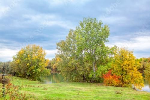 Lake autumn foliage , colorful fall trees