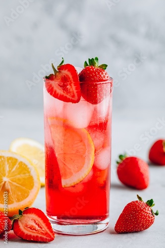 Refreshing Strawberry and lemon Iced Tea or lemonade in a glass