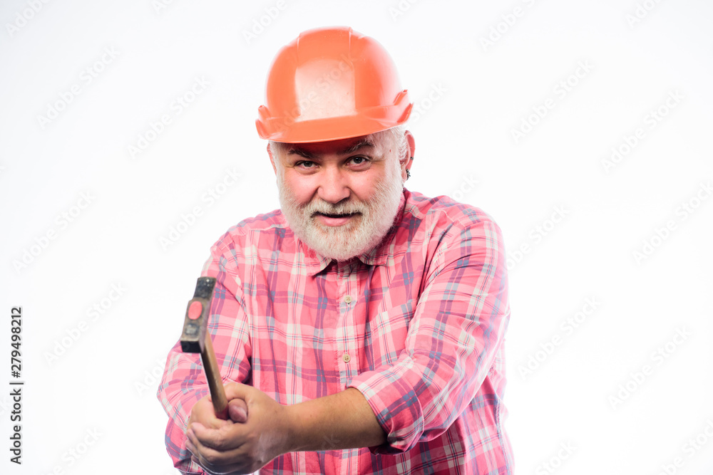 He loves his job. construction build. mature bearded man in hardhat. professional repairman in helmet. man builder use hammer tool. architect repair and fix. engineer worker He loves his job. construction build. mature bearded man in hardhat. professional repairman in helmet. man builder use hammer tool. architect repair and fix. engineer worker