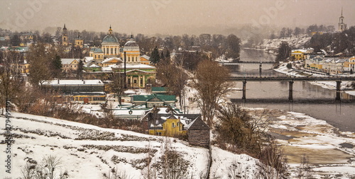 Snowfall on  cloudy winter day in  ancient Russian city of Torzhok photo