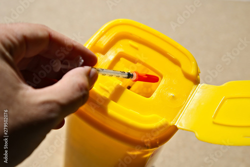 Medical waste container inside a hospital photo