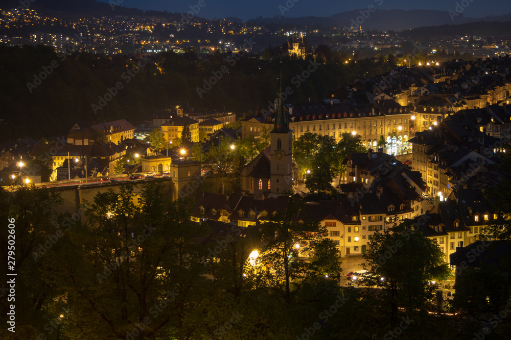 Beautiful town of bern city at night time for background with copy space