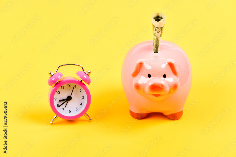 need time to get rich. budget increase policy. business startup. financial position. success in finance and commerce. piggy bank with alarm clock. Moneybox. retirement. family budget. time is money