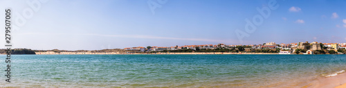 View of the Vila Nova de Mil Fontes town from the praia das Furnas beach on the other side of the Mira river