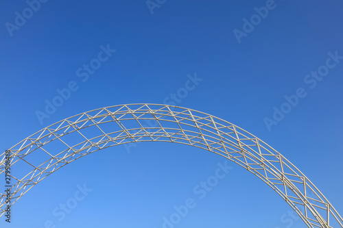 Steel arch in blue sky