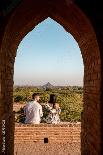 Bagan Myanmar during sunrise, men and woman mid age visit Bagan hisorical site during sunrise at vacation Pagan Myanar photo