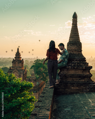 Bagan Myanmar during sunrise, men and woman mid age visit Bagan hisorical site during sunrise at vacation Pagan Myanar photo