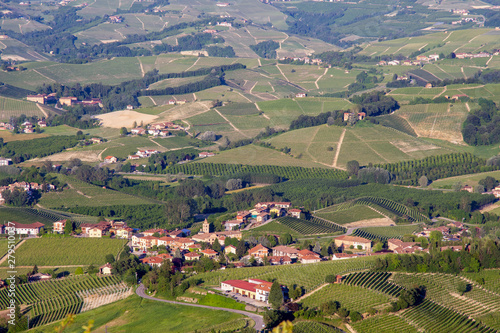 Panoramic view of the vineyard hills in the Langhe area, Unesco World Heritage Site since 2014, with the small hamlet of Annunziata, La Morra, Cuneo, Piedmont, Italy