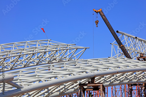 Truss girder and crane