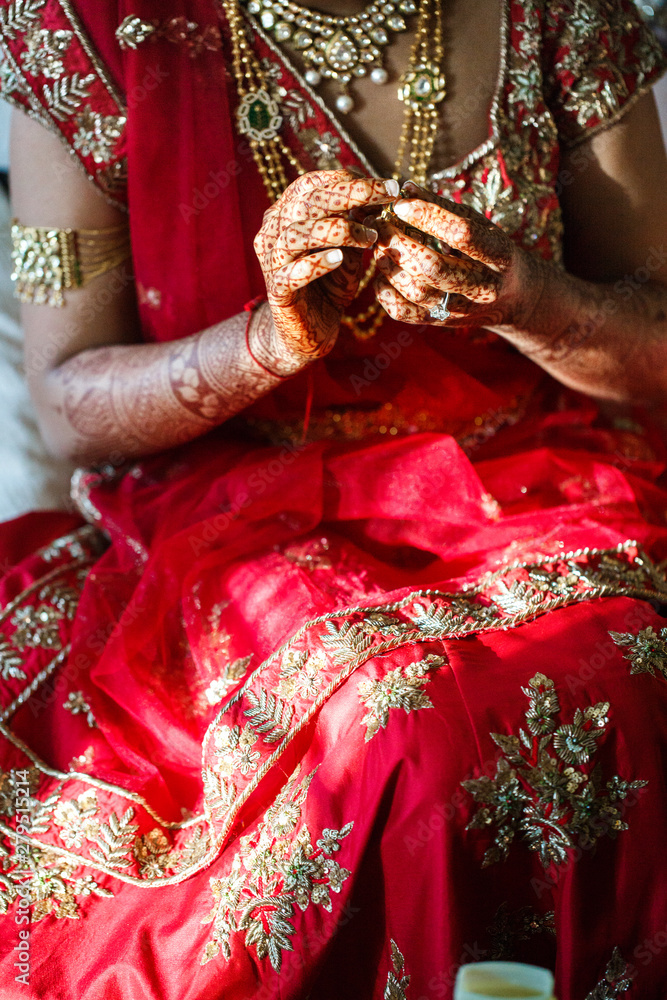 indian bride wears jewelry on her wedding day
