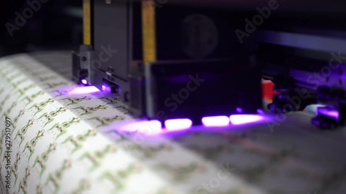 Super slow motion shot UV LED textile laser printer