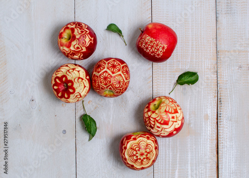 red and green apples carving from angkana photo