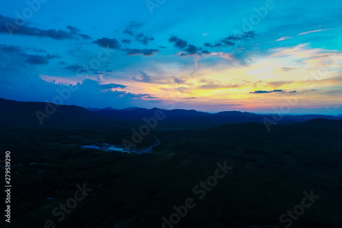 Amazing silhouette mountain sunset with colorful sky nature background