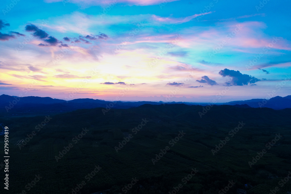 Amazing silhouette mountain sunset with colorful sky nature background