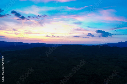 Amazing silhouette mountain sunset with colorful sky nature background