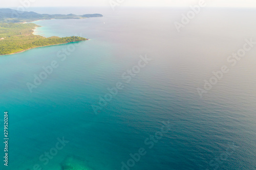 Green island white sand beach turquoise sea water