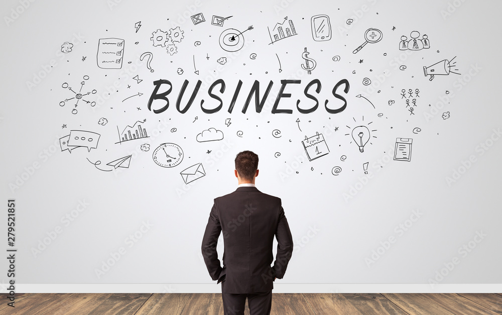 Young manager in doubt looking to a wall with business concept Young manager in doubt looking to a wall with business concept
