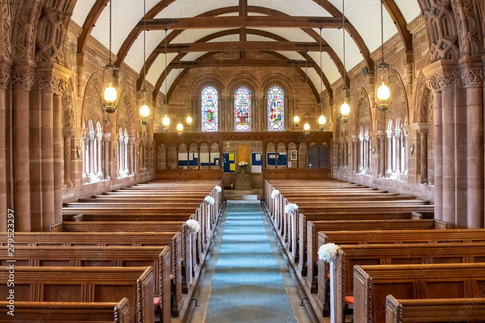 Inside view of a church looking up  the aisle