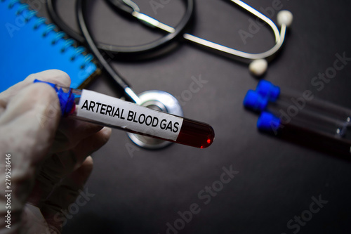 Arterial Blood Gas text on Sticky Notes. Top view isolated on black background. Healthcare/Medical concept