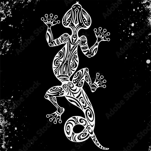 Vector drawing of a lizard or salamander with ethnic patterns of Aboriginal Australia. On the grange background. Image salamandy as a tattoo. photo