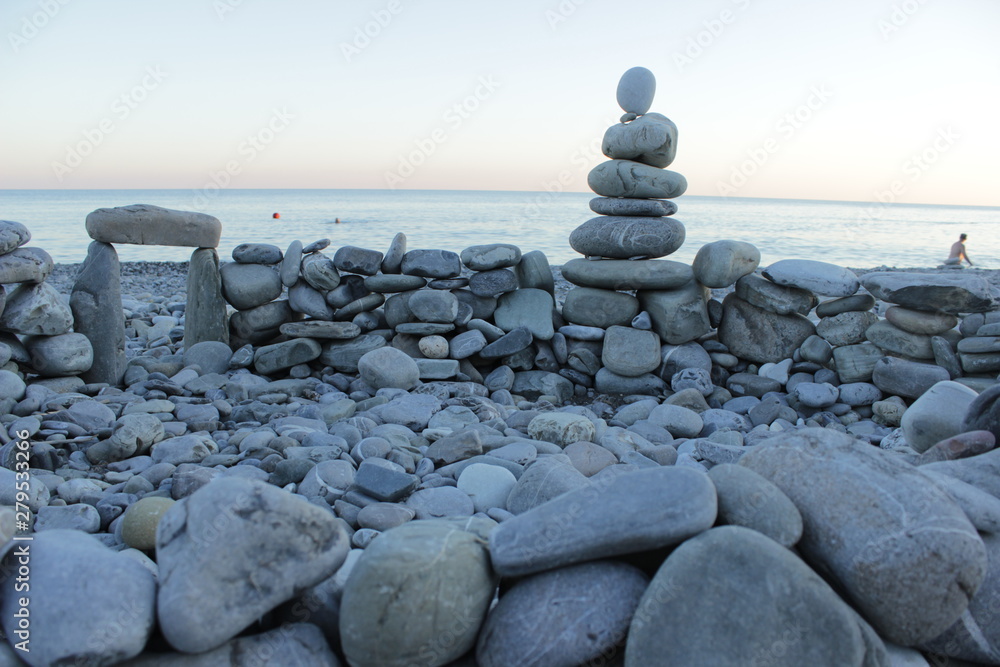 Naklejka stack of stones on beach