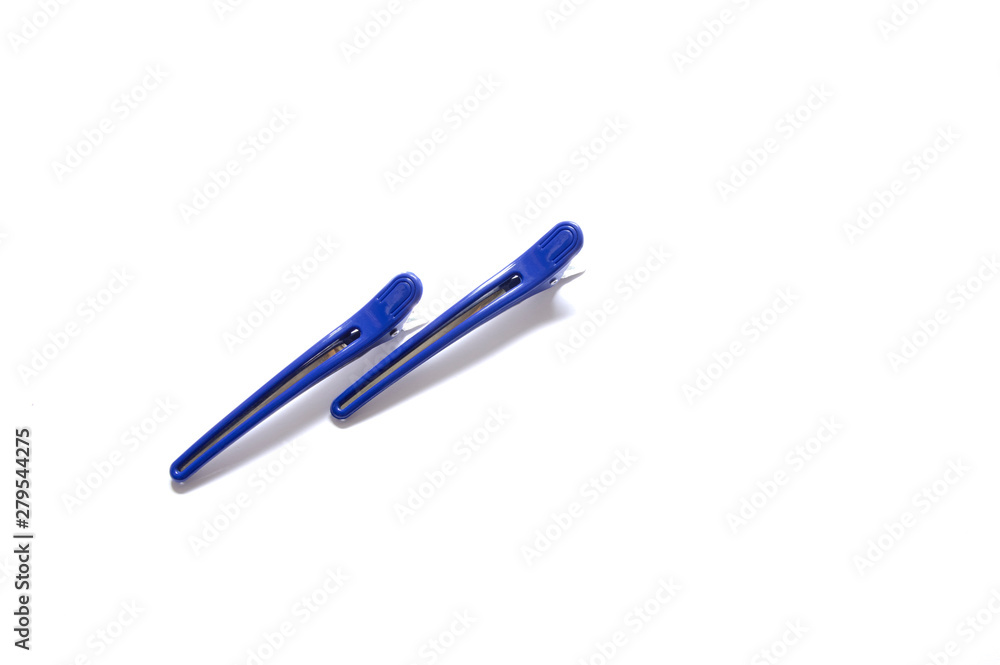 blue plastic hair clip on white isolate background blue plastic hair clip on white isolate background