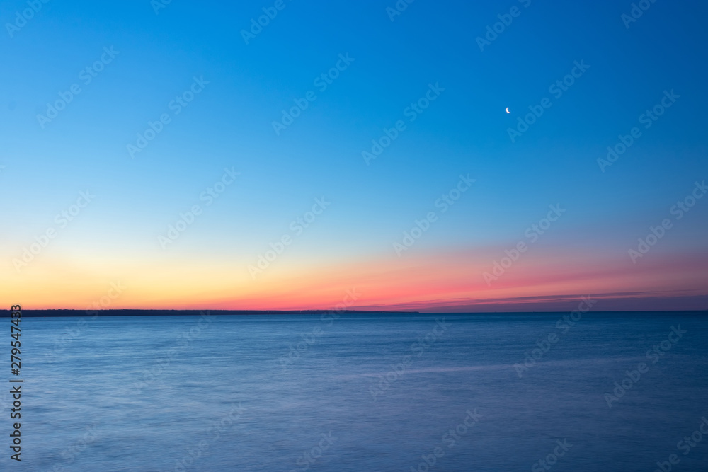 early morning sunrise on a choppy river / wind early spring landscape early morning sunrise on a choppy river / wind early spring landscape
