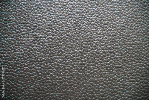 Luxury black genuine leather texture close up