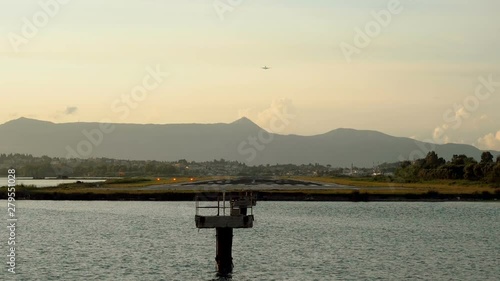 Passenger airplane flying in the sky. Aircraft taking off from the runway at the airport of Corfu. Greece. Slow motion. HD