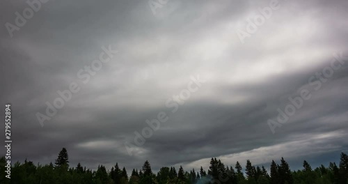 Time lapse clouds, rolling puffy cloud are moving, white lightnes clouds time lapse. 4k Timelapse of white clouds with blue sky photo