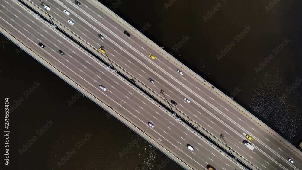 Top down spin view of cars bridge from birds eye. Cinematic view Top down spin view of cars bridge from birds eye. Cinematic view