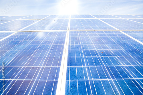 solar panels with the sunny sky. Blue solar panels. background of photovoltaic modules for renewable energy.