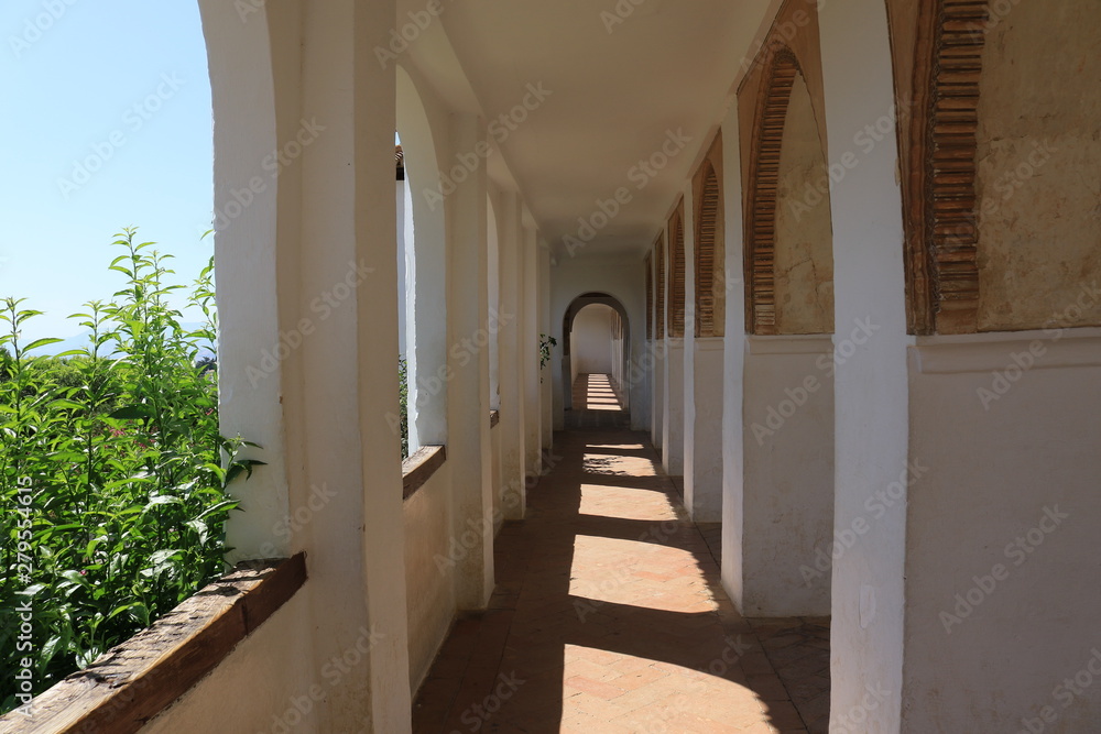 sunlit passage in alhambra spain