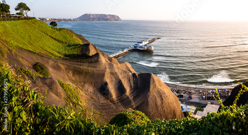 Panoramic view of the coast shore cliff called "costa verde" from the Miraflores Pier and the ocean as back ground, in Lima, Peru.