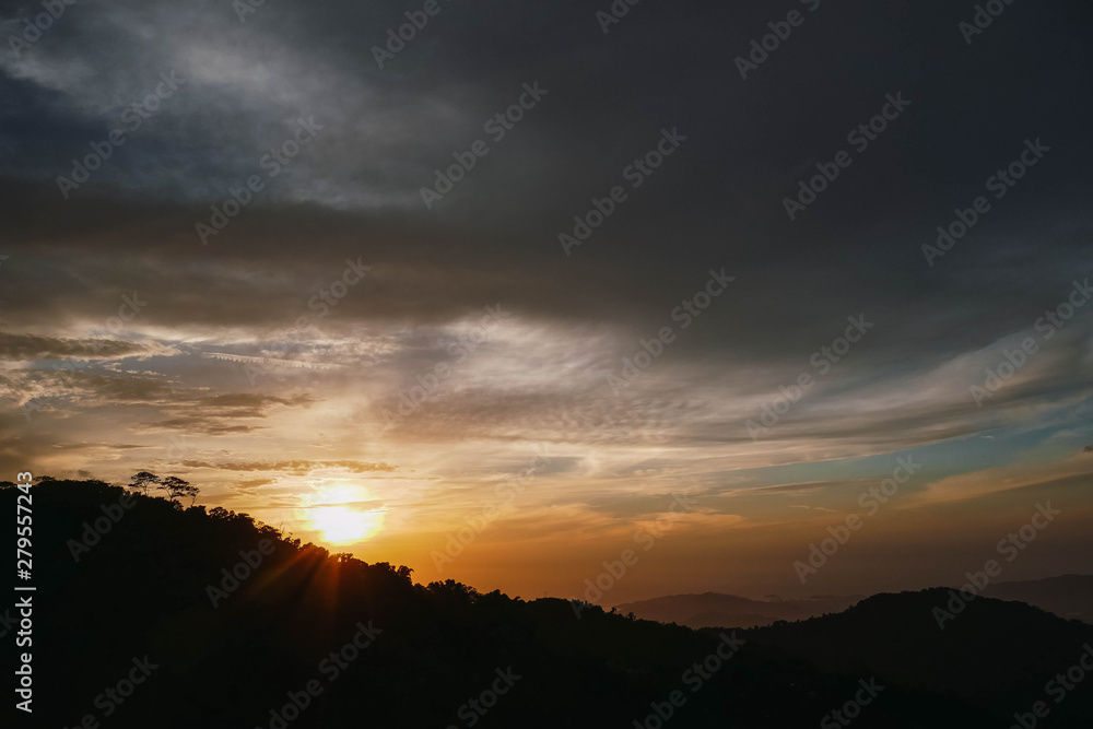 Beautiful sunset, Mountain landscape with warm light in Minca, Magdalena, Colombia.
