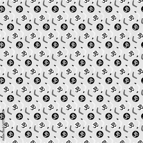 Conceptual, creative design of karma/ yin yang with the aum/om/ohm symbol and chevron patterned boomerangs in white and black