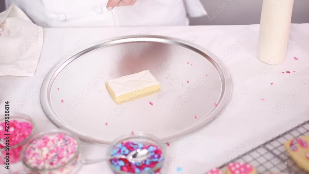 Step by step. Decorating sugar cookies with royal icing and sprinkles for Valentine's day. Step by step. Decorating sugar cookies with royal icing and sprinkles for Valentine's day.