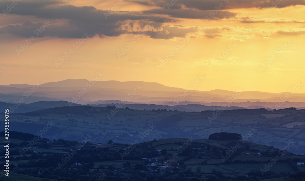 Sunset Light Over Rolling Hills of Shropshire in UK