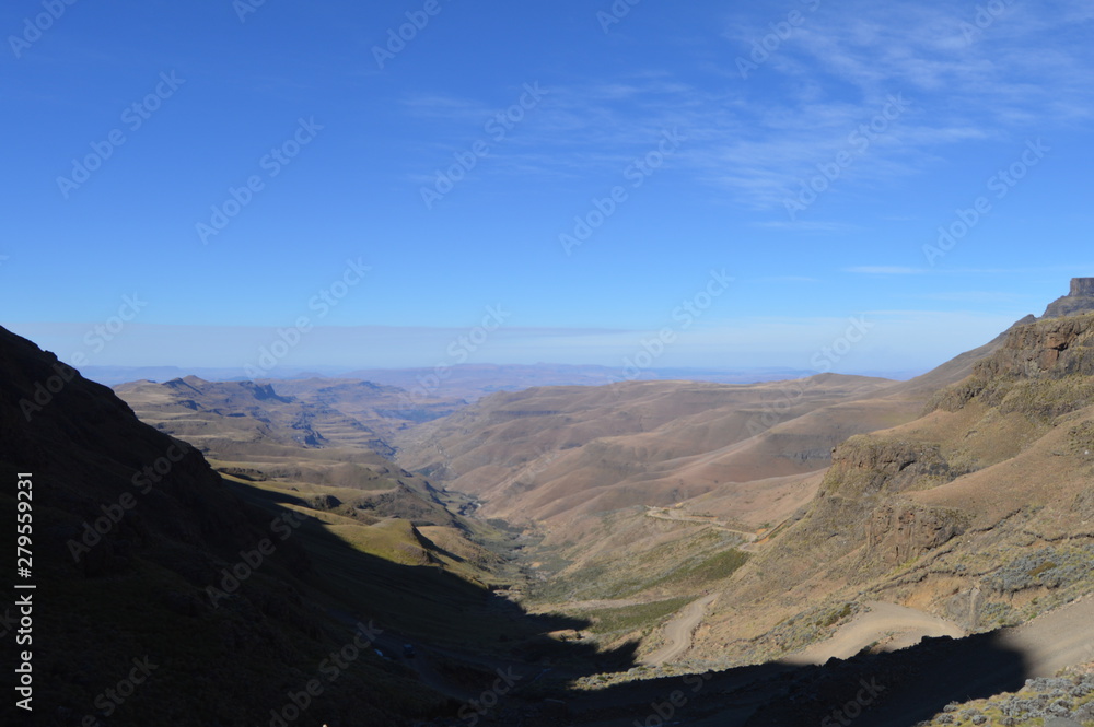 Greenery in Sani pass under blue sky near kingdom of Lesotho South Africa border near KZN and Midlands meander