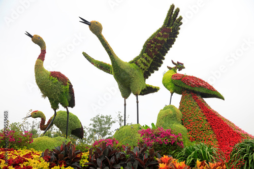 Green sculpture of birds © zhang yongxin