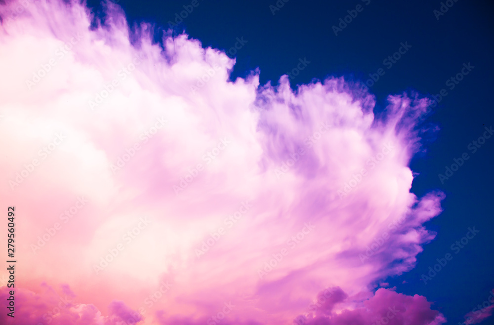 Fototapeta premium surrealistic fluffy pink cloud on blue sky - cotton candy
