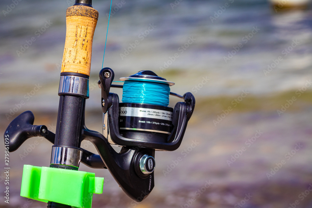 Close up of reel of fishing rod Close up of reel of fishing rod