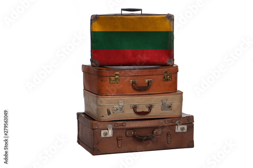 Lithuania, Lithuanian travel concept. Group of vintage suitcases isolated on white background.