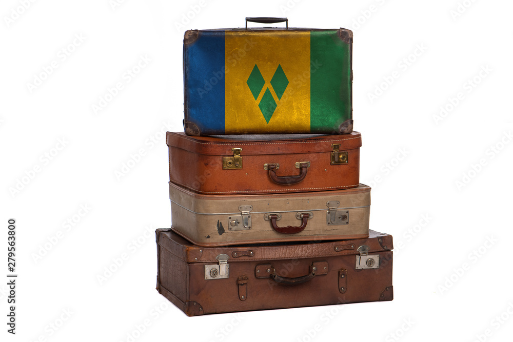 Saint Vincent and the Grenadines travel concept. Group of vintage suitcases isolated on white background. Saint Vincent and the Grenadines travel concept. Group of vintage suitcases isolated on white background.