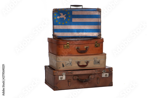 South Cameroon travel concept. Group of vintage suitcases isolated on white background.